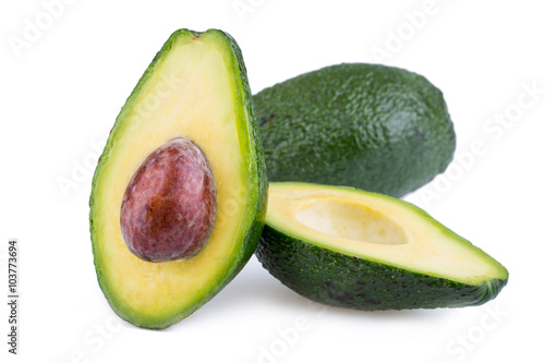 Avocado slices isolated on a white background.