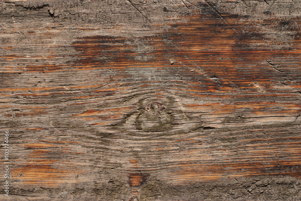 Naklejka premium Old wooden surface with stone chips