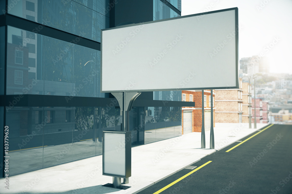 Fototapeta premium Big blank billboard and small blank poster on city street close