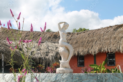 Mermaid fountain with flowers