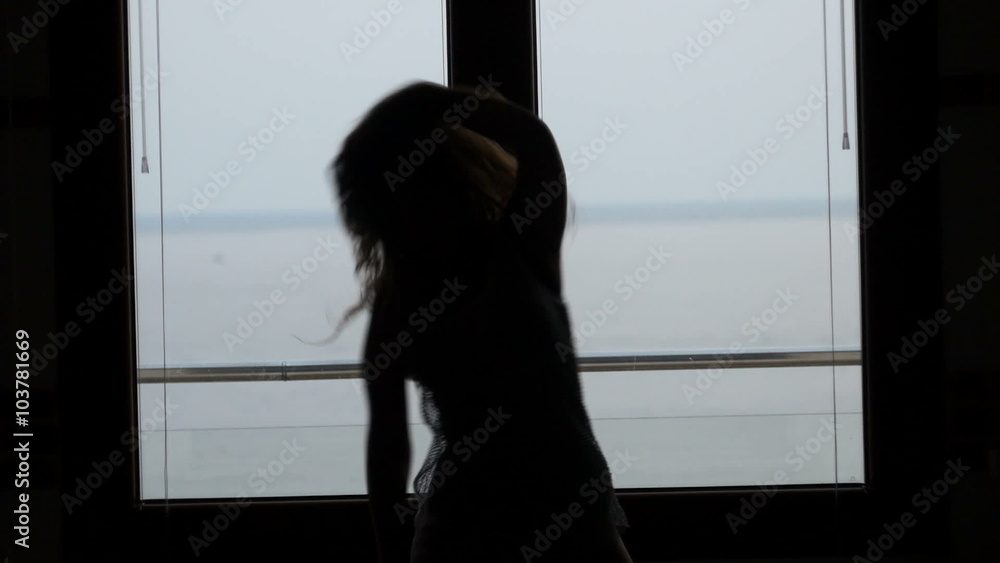 dancing silhouette in front of a window dancing silhouette in front of a window