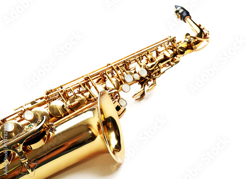 Photography Golden saxophone isolated on white background, close up