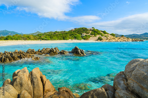 Rocks in crystal clear sea water of Villasimius beach, Sardinia island, Italy © pkazmierczak