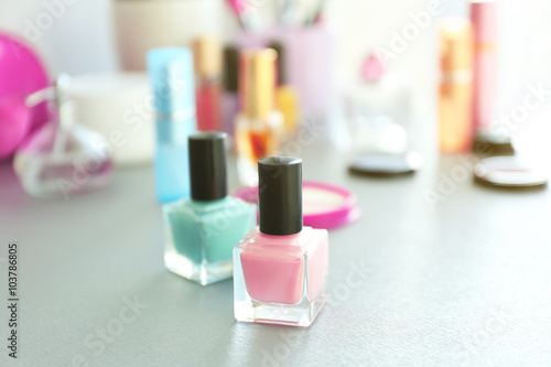 Nail polish with makeup cosmetics on a table