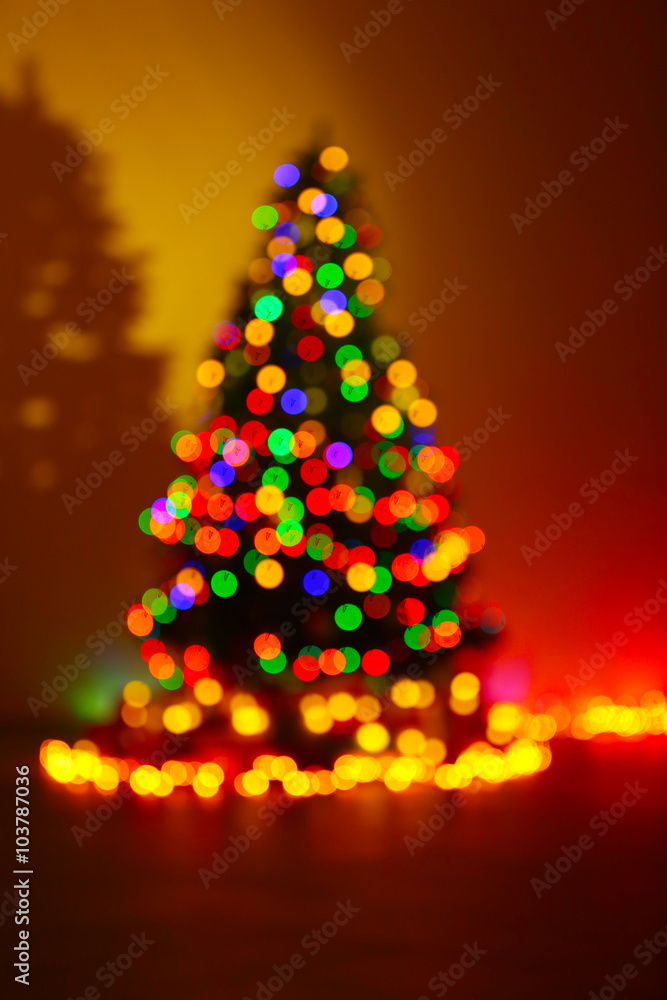 Christmas tree in a dark room