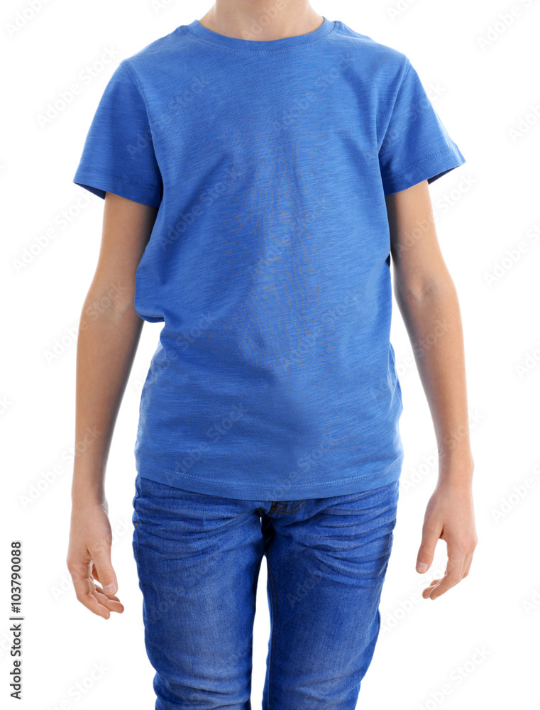 Clothes advertising. Boy in blue T-shirt and jeans isolated on white background, close up Clothes advertising. Boy in blue T-shirt and jeans isolated on white background, close up