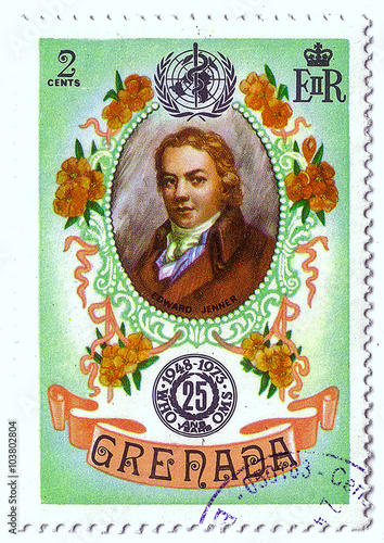 Grenada - circa 1973: postal stamp printed in Grenada shows Edward Jenner, series 25th anniv of WHO, circa 1973 photo