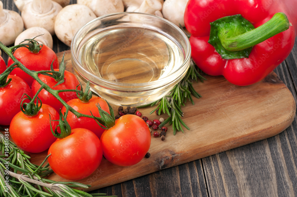 cooking background - oil, mushrooms, cherry tomatoes, pepper and cooking background - oil, mushrooms, cherry tomatoes, pepper and