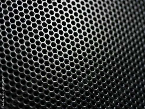 Mesh background. Meshy metal structure with shallow depth of field. 