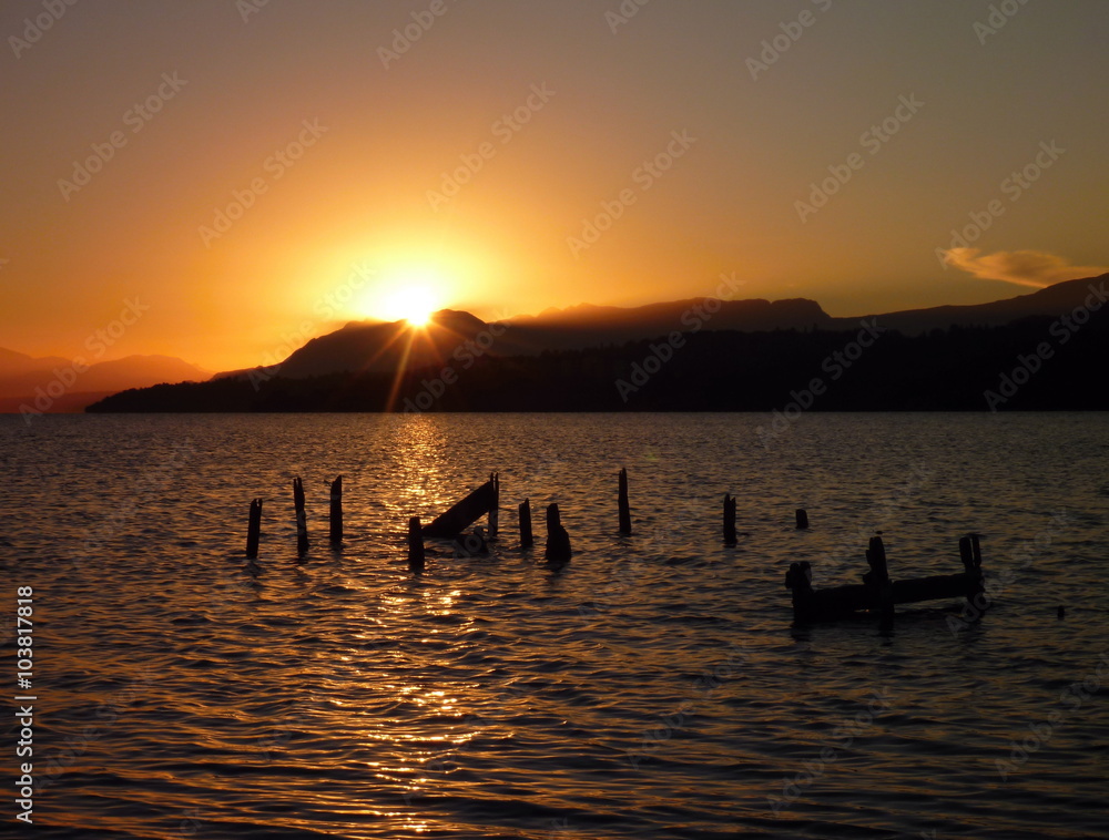 beautiful romantic sunrise at lago villarica in chile