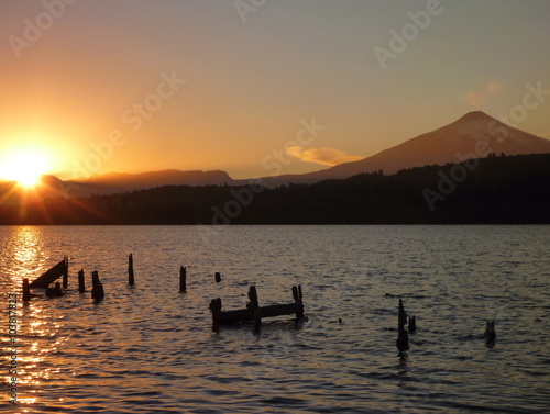 beautiful romantic sunrise at lago villarica in chile