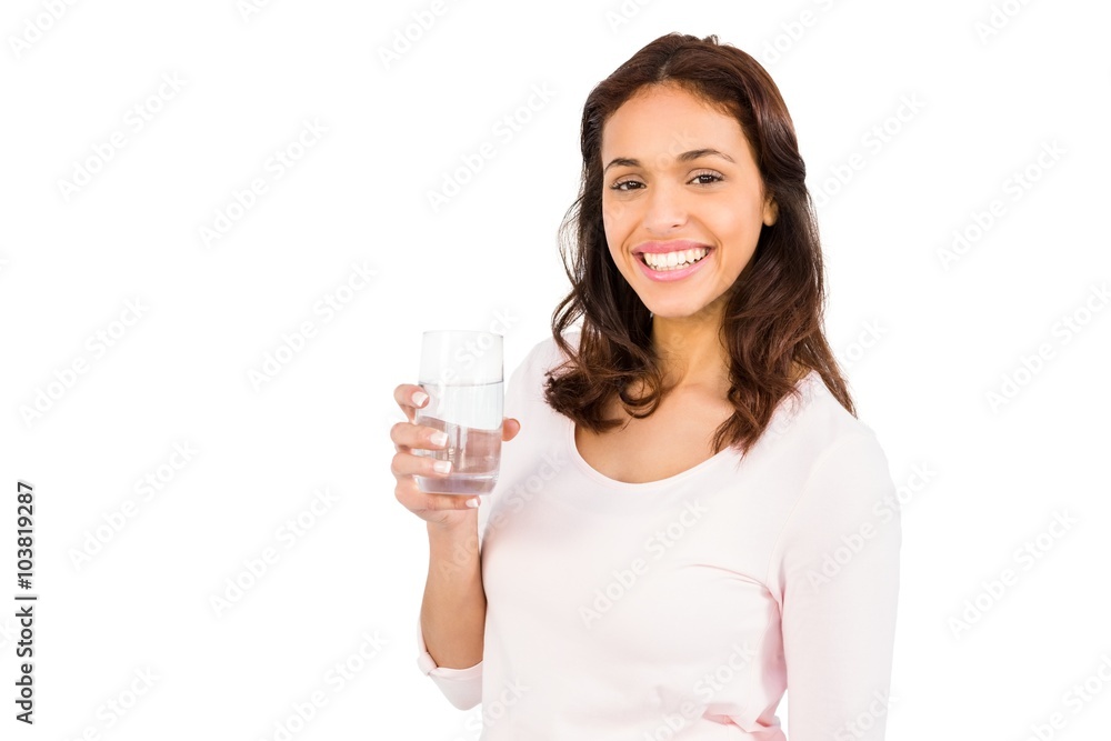Smiling woman holding glass of water Smiling woman holding glass of water