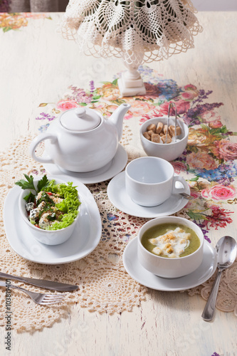 beautifully served table in vintage style with lunch - tea, soup
