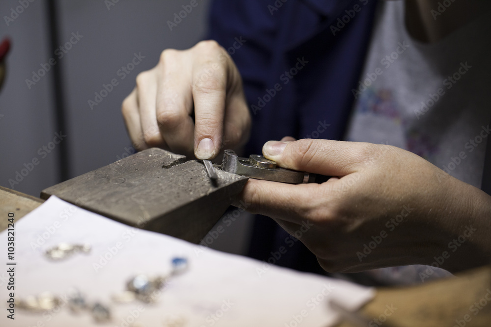 man's hands making souvenirs man's hands making souvenirs