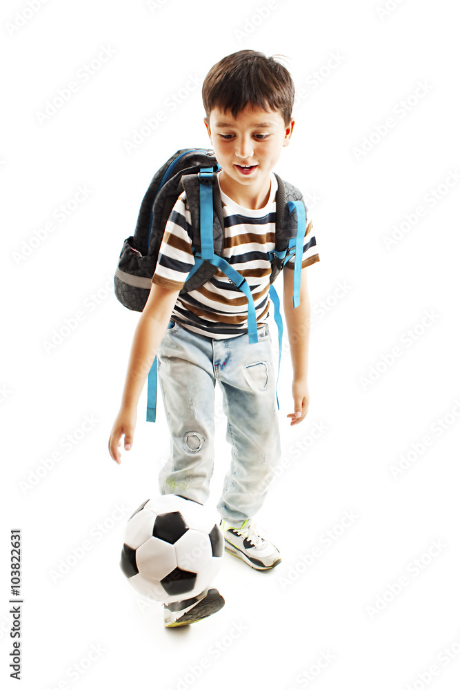 Full length portrait of a schoolboy with a soccer ball. Isolated on white background Full length portrait of a schoolboy with a soccer ball. Isolated on white background