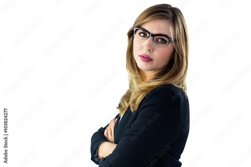 Woman with arms crossed looking at camera Woman with arms crossed looking at camera