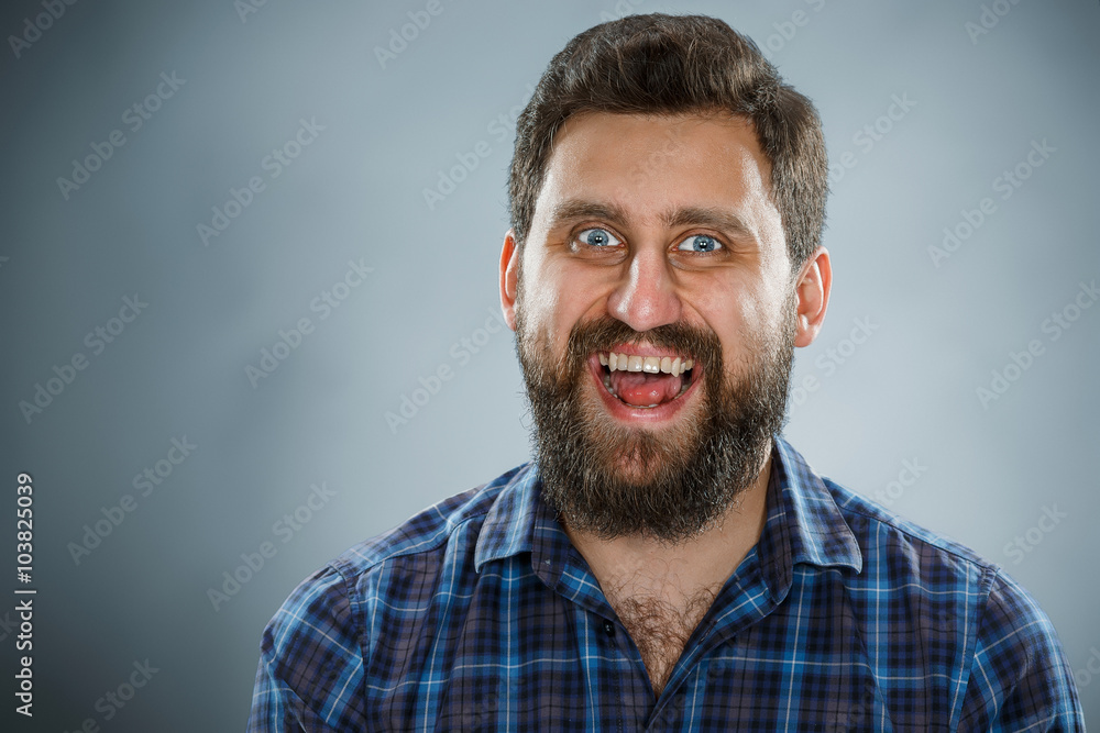 Closeup headshot portrait, happy handsome business man in blue shirt Closeup headshot portrait, happy handsome business man in blue shirt