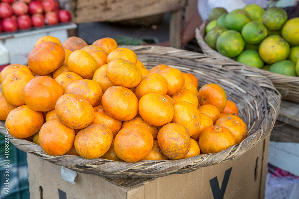 fresh mandarin group on basket from market