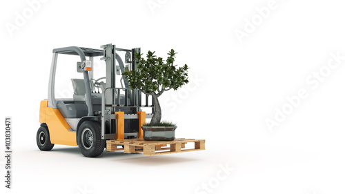 Modern forklift truck with small tree photo