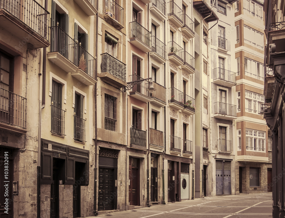 Urban street in Bilbao, Spain. Retro toned.