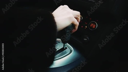 switching speed in the car woman's hand