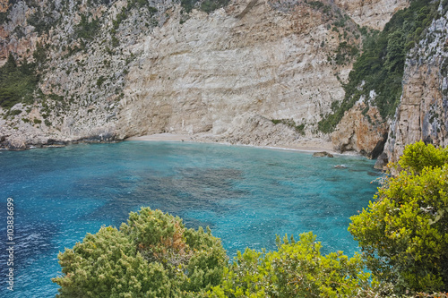Blue water and rocks of small beach at Zakynthos island  Greece