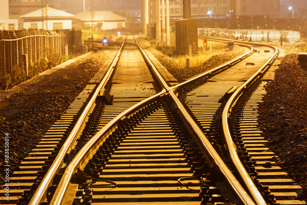 Industrial railway track at dusk