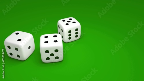 3 rolling dice on a green background