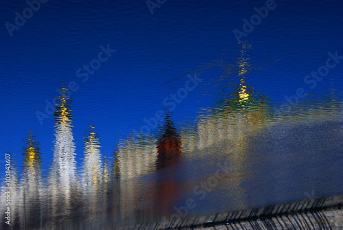 Moscow Kremlin. Color photo. Abstract water reflection photo