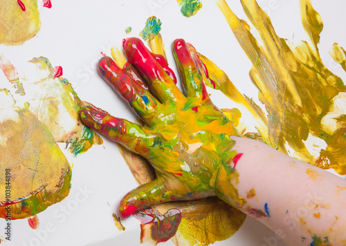Abstract picture drawn by a child's palm on a paper