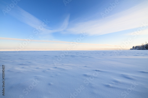 Fototapeta Naklejka Na Ścianę i Meble -  Frozen lake scape and blue sky