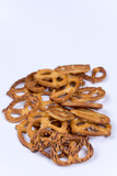 A bunch of pretzels on a white surface