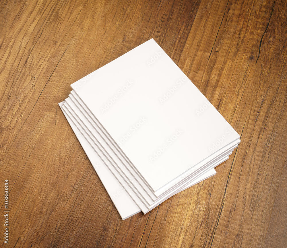 Blank catalog, magazines,book mock up on wood background Blank catalog, magazines,book mock up on wood background