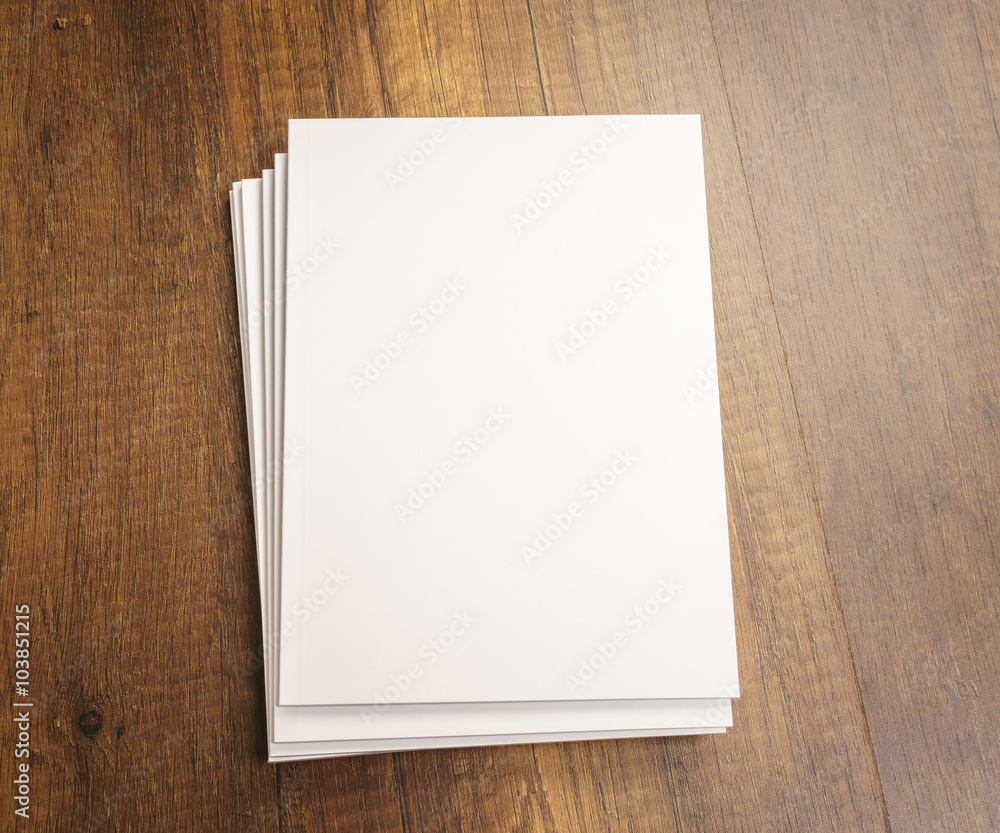 Blank catalog, magazines,book mock up on wood background Blank catalog, magazines,book mock up on wood background