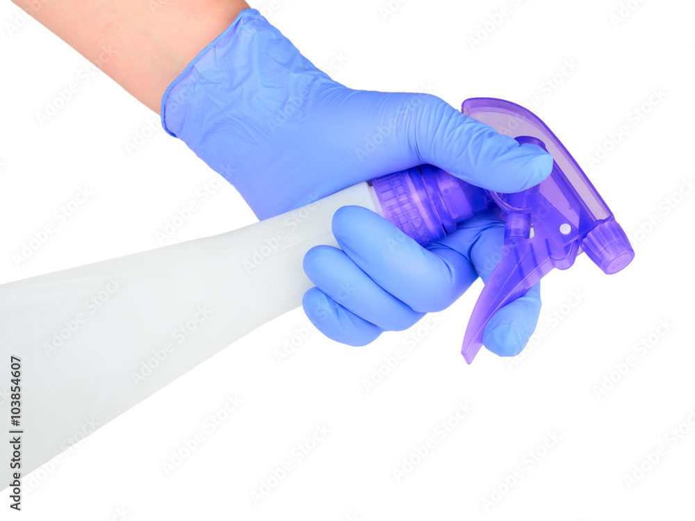 hand with cleaning spray hand with cleaning spray