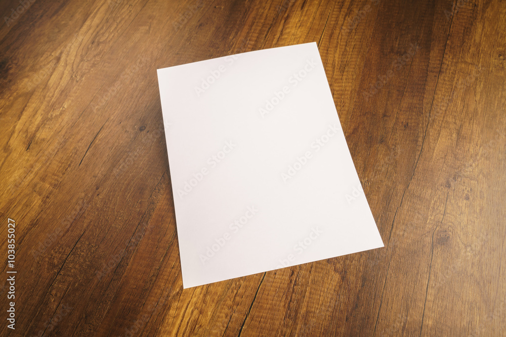 White template paper on wood texture White template paper on wood texture