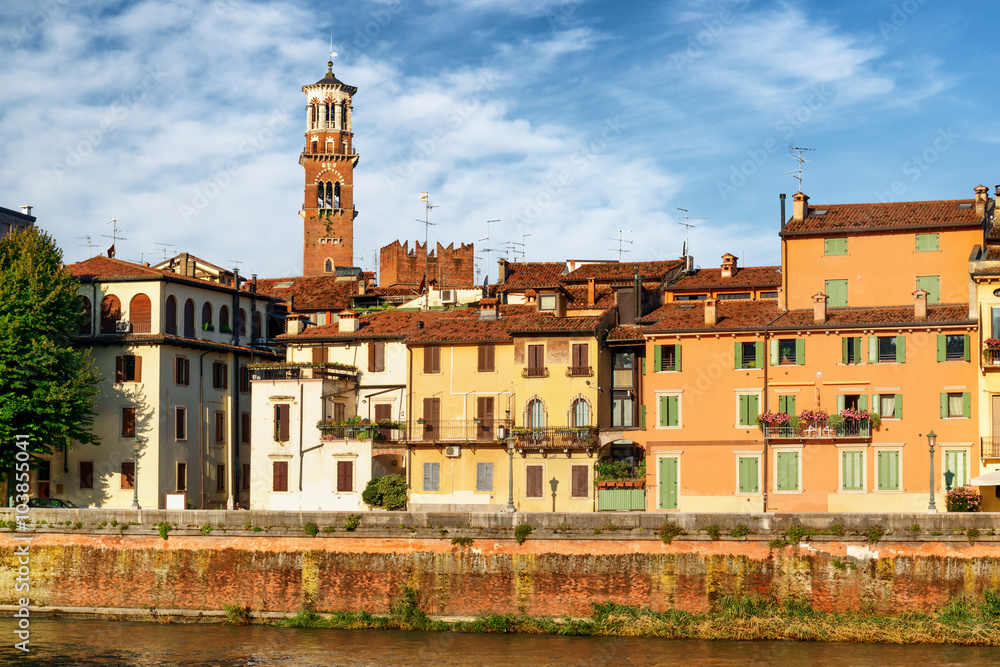 Old houses and the Torre dei Lamberti tower in Verona, Italy