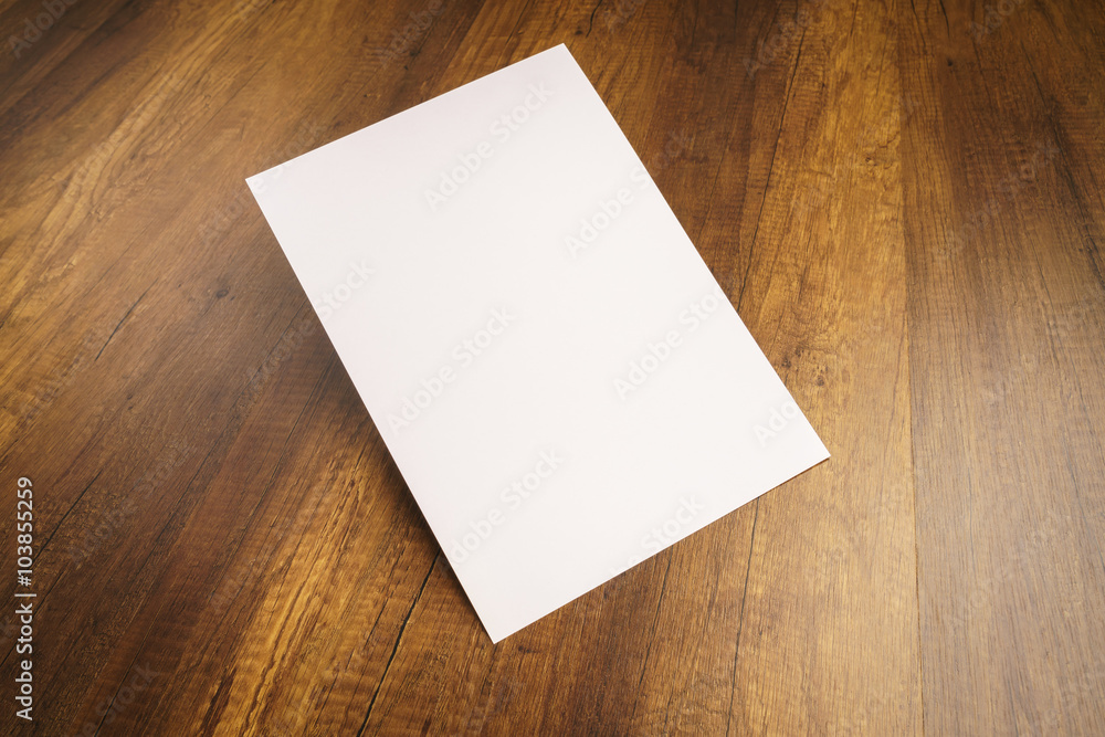 White template paper on wood texture White template paper on wood texture