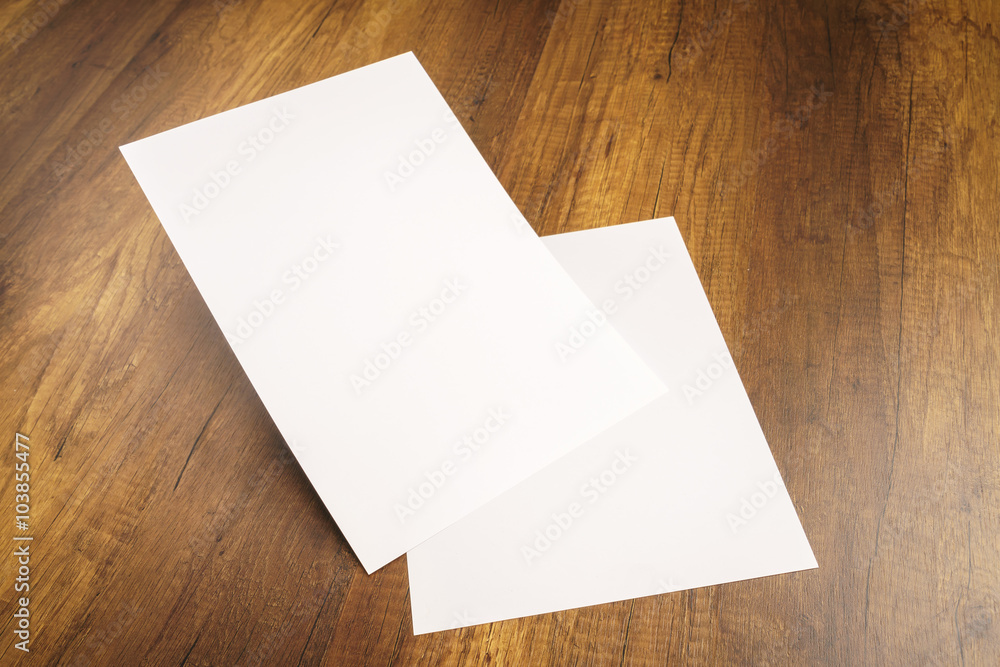 White template paper on wood texture White template paper on wood texture