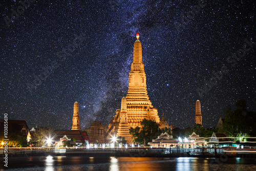 Photography Wat Arun temple on the background of the starry sky. Bangkok. Th