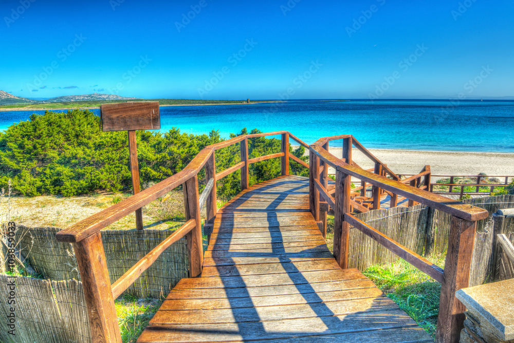 wooden stairs to the beach in Sardinia