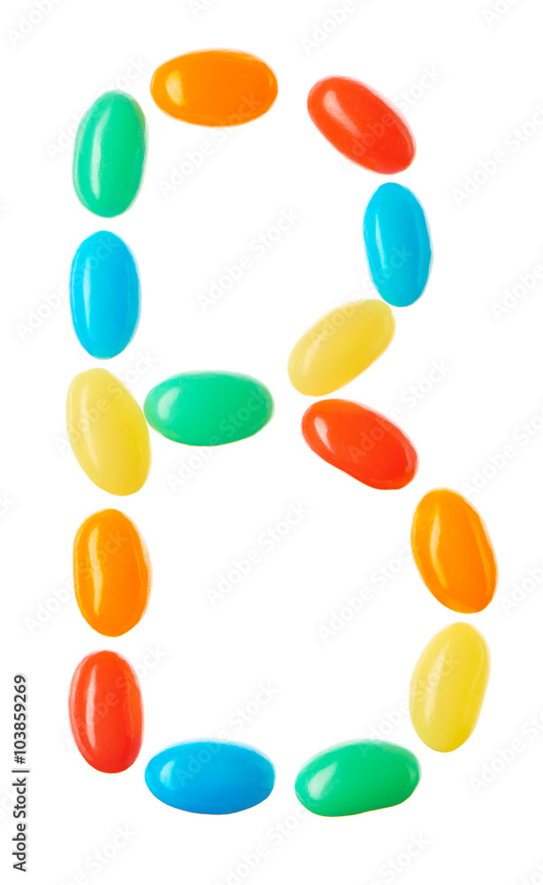 B letter made of multicolored candies isolated on white