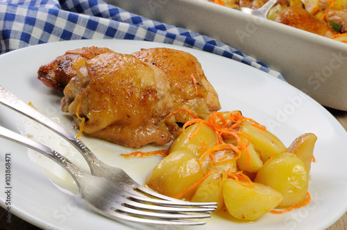 Pieces of chicken with potatoes photo