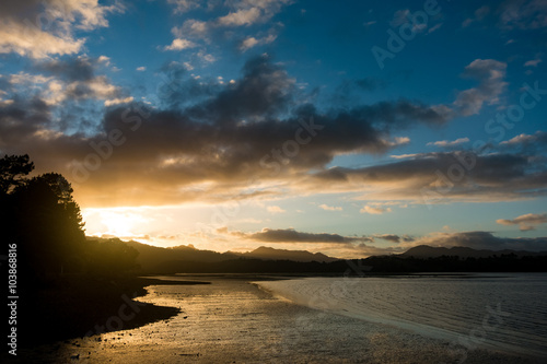 sunrise in sea bay New Zealand