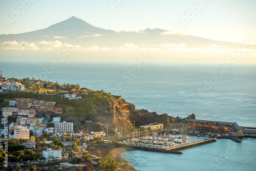 San Sebastian cityscape view on La Gomera island with Tenerife island on the background on the morning photo