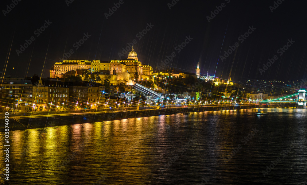 Budapest Castle at night from danube river, Hungary. Cross Filter Effect