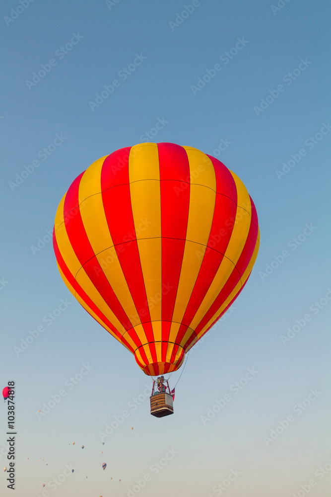 Fototapeta premium Colorful hot air balloon early in the morning