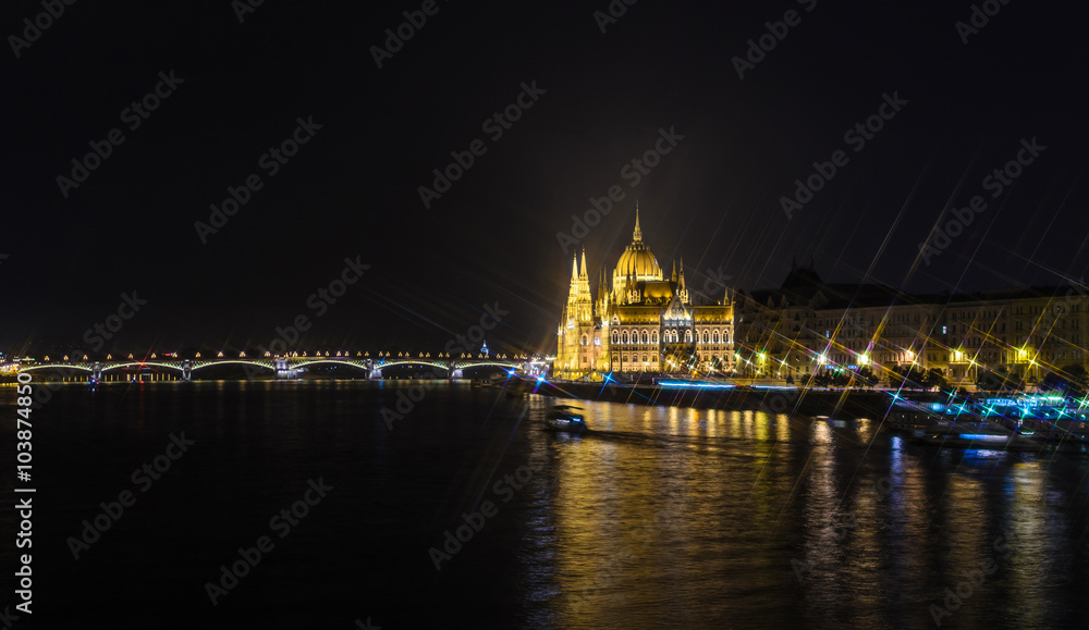Hungarian parliament at night, Budapest. Cross Filter Effect