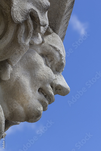 gargoyle on Cloth Hall on main market square in Cracow, Poland