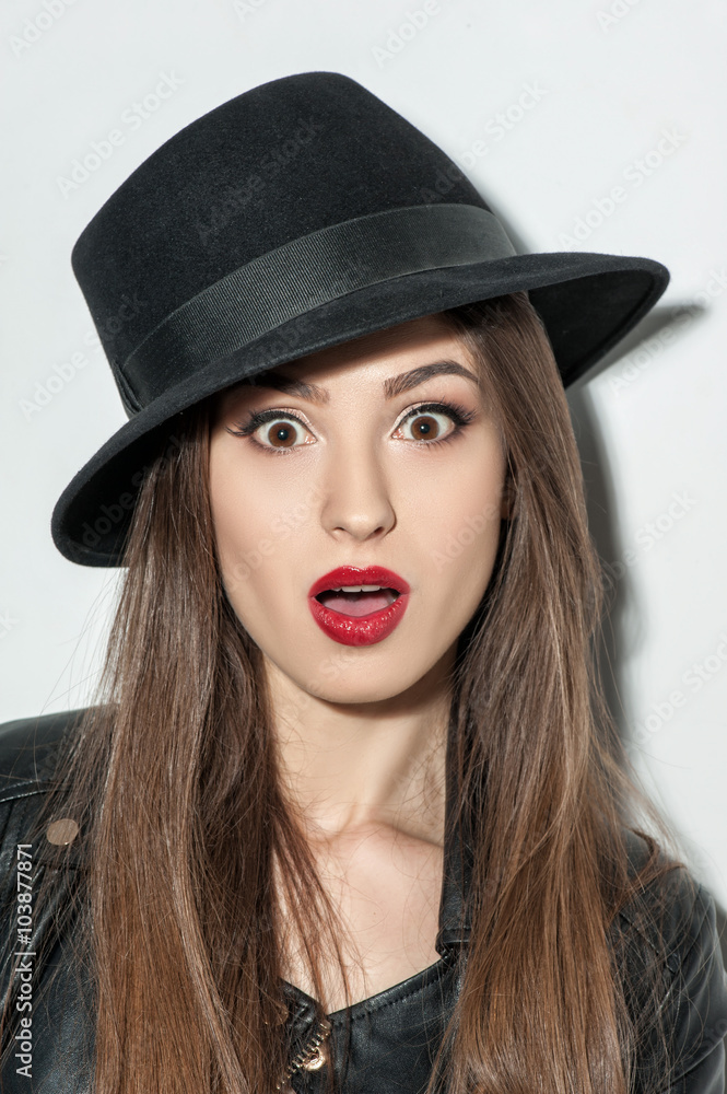Attractive young woman is expressing her surprise Attractive young woman is expressing her surprise
